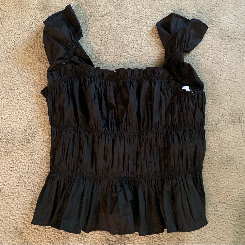 Ruffled black top